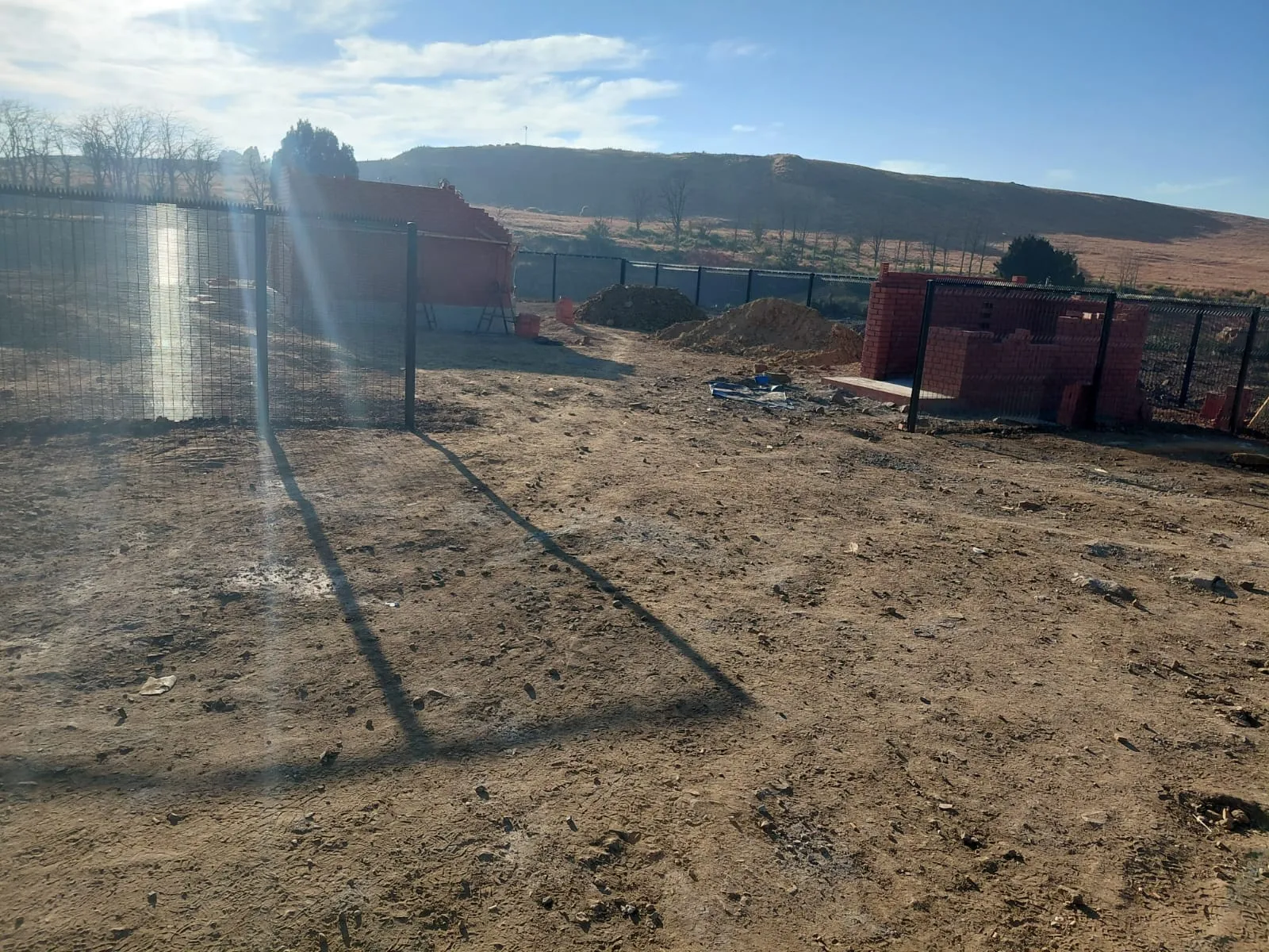 Capstone perimeter fence installation progress 7