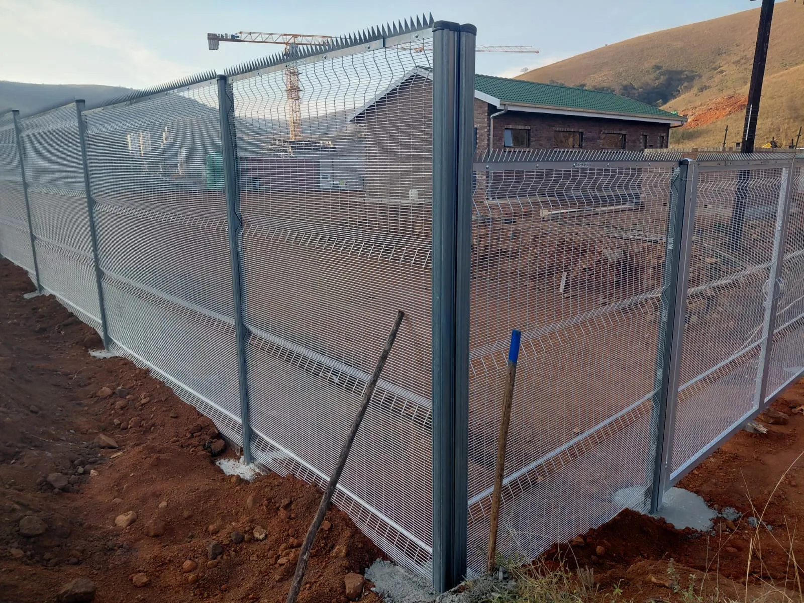 Capstone perimeter fence installation progress 9