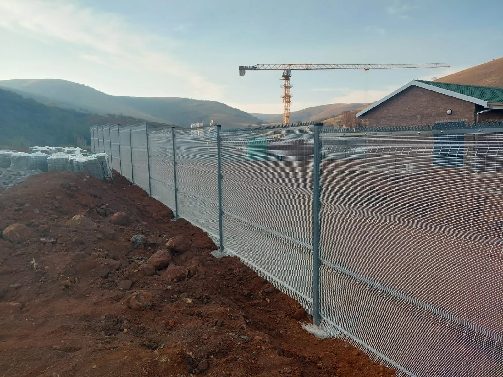 Capstone perimeter fence installation progress 12