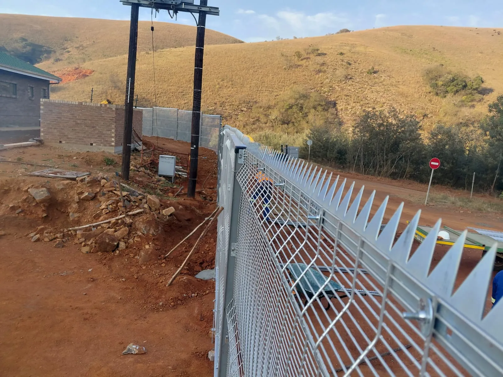 Capstone perimeter fence installation progress 14