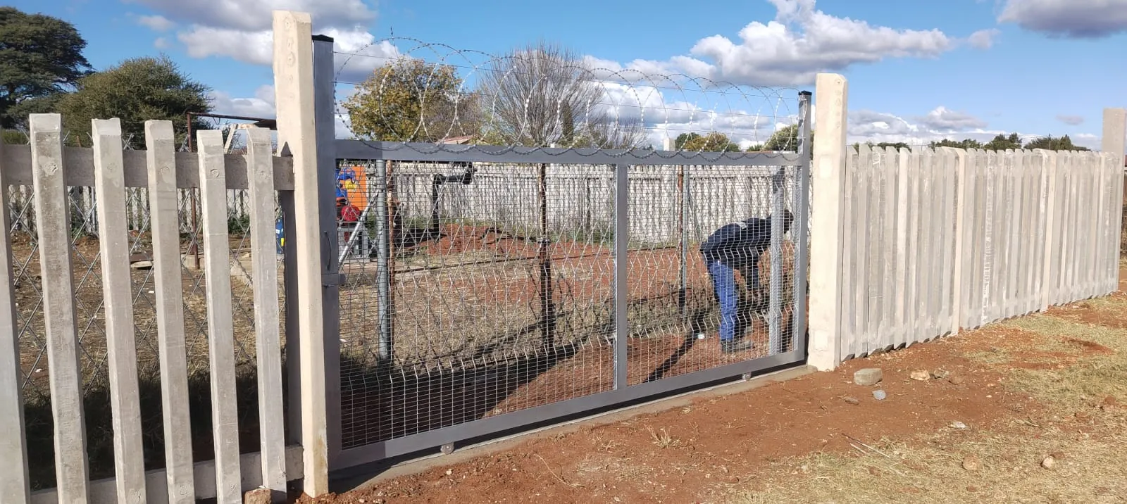 Capstone perimeter fence installation progress 19