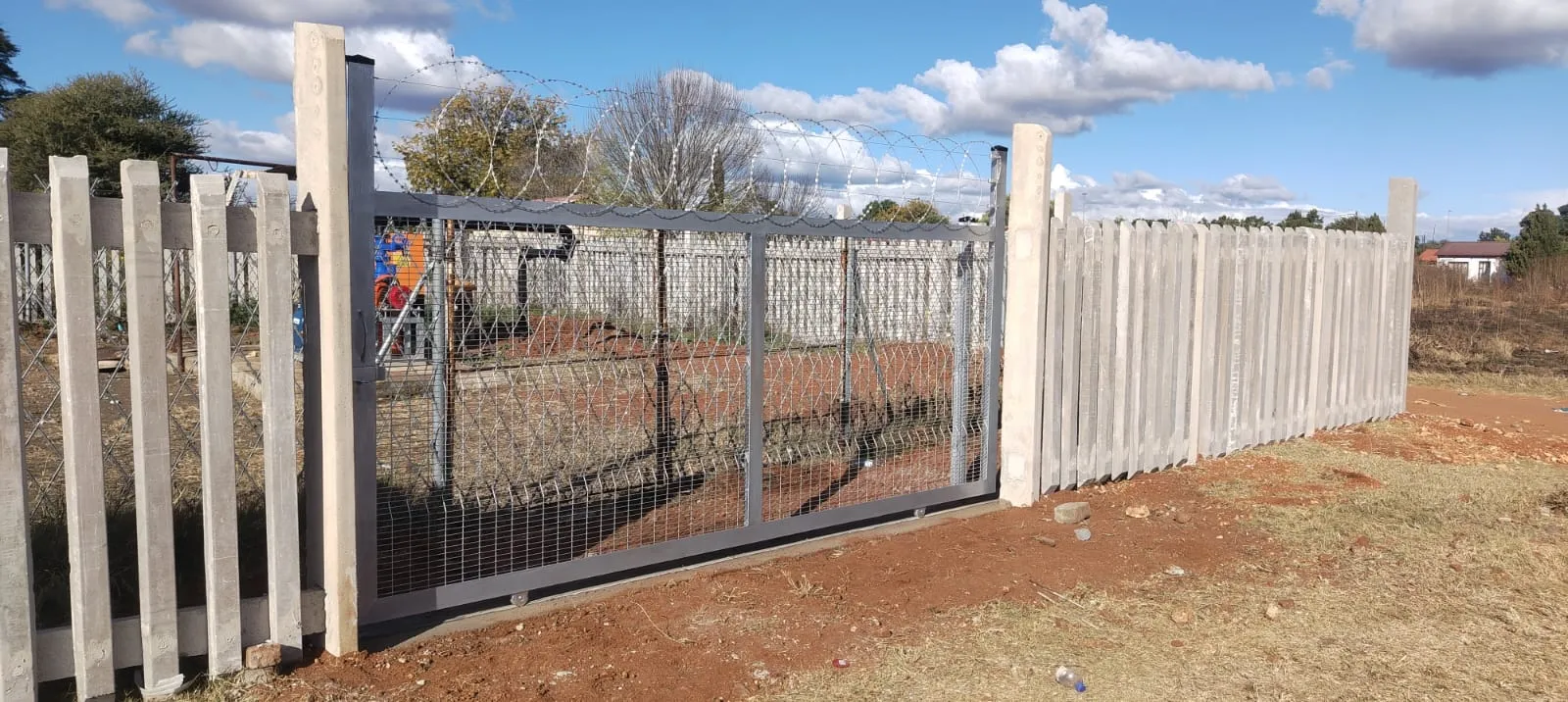Capstone perimeter fence installation progress 23