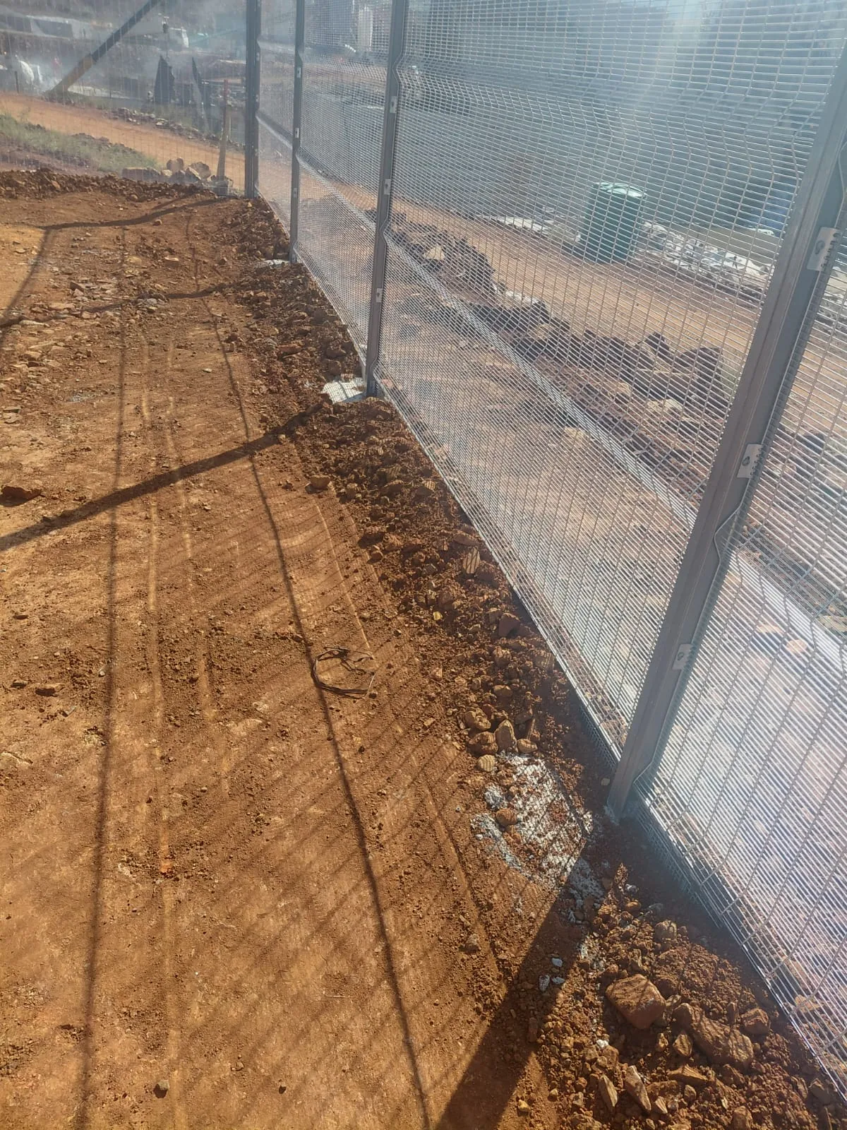 Capstone perimeter fence installation progress 24
