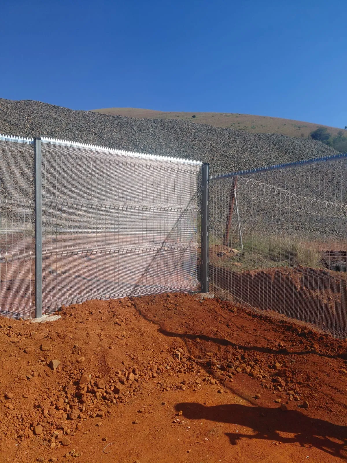 Capstone perimeter fence installation progress 25