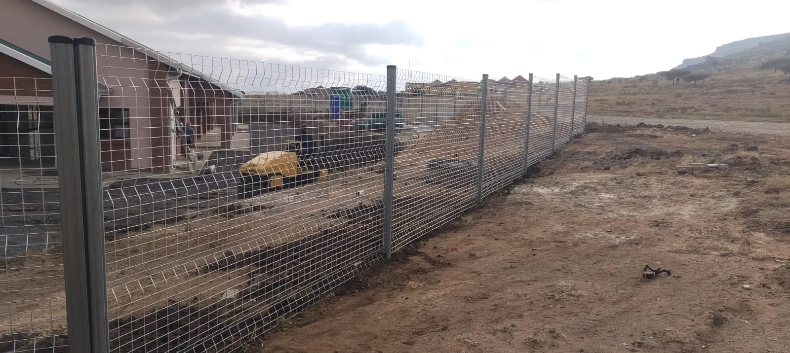 Capstone perimeter fence installation progress 32
