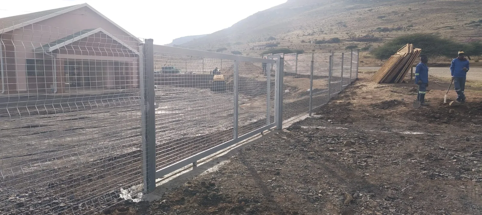 Capstone perimeter fence installation progress 34