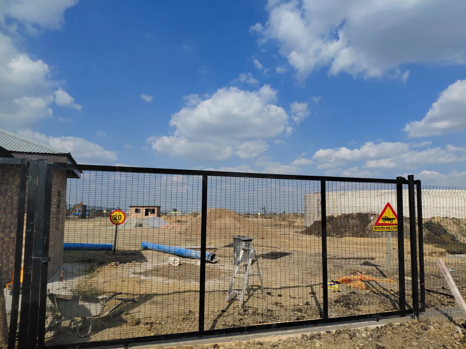 Capstone perimeter fence installation progress 36