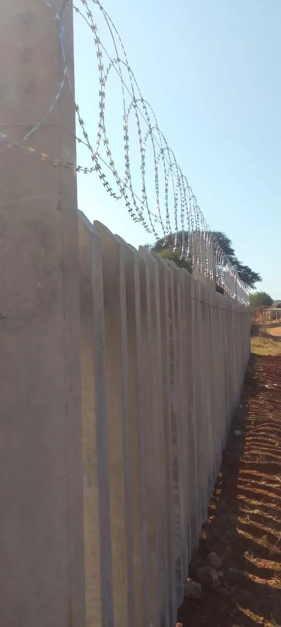 Capstone perimeter fence installation progress 38